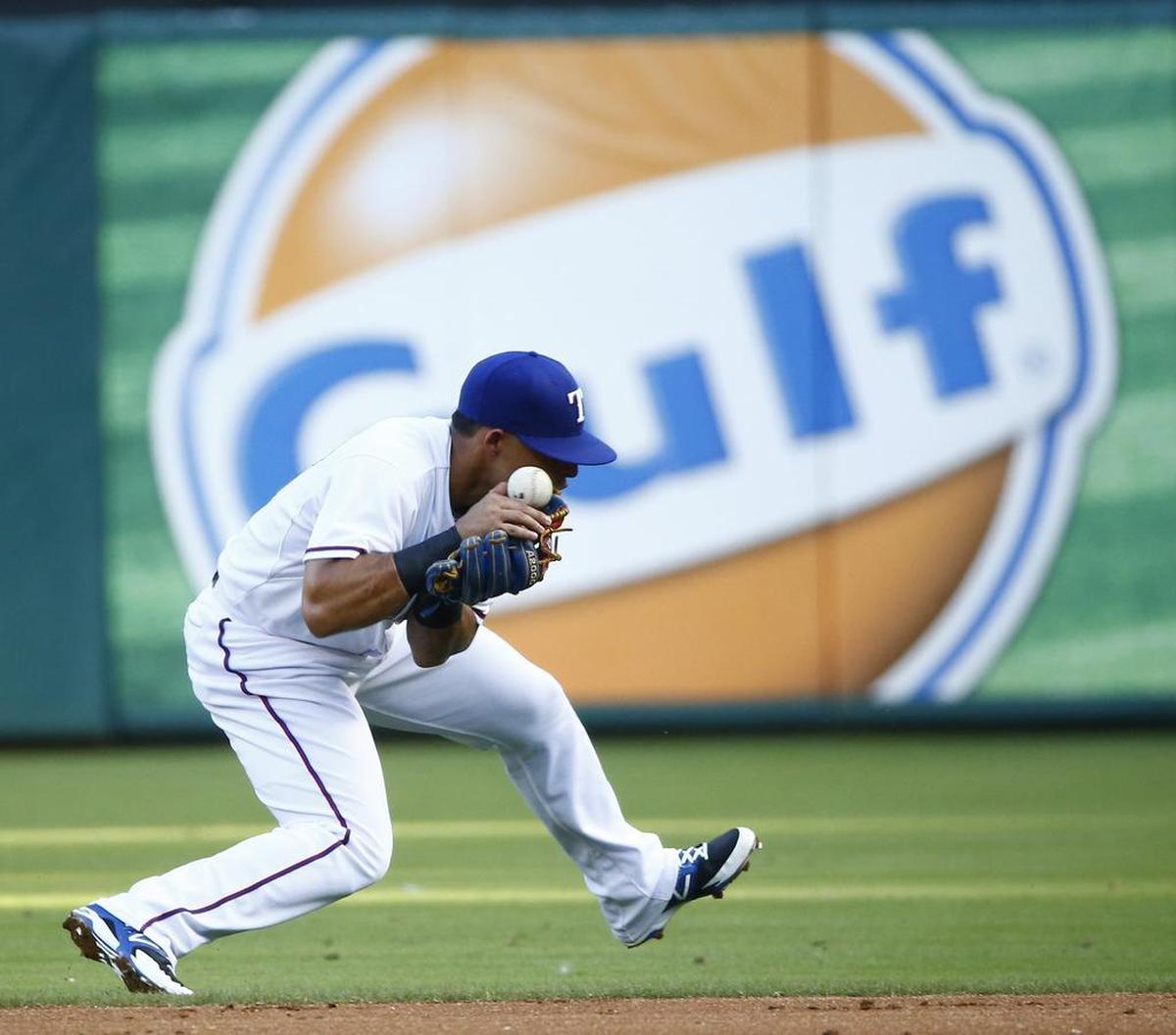 Texas Rangers second baseman Rougned Odor made an error on this play against the Oakland A’s.
