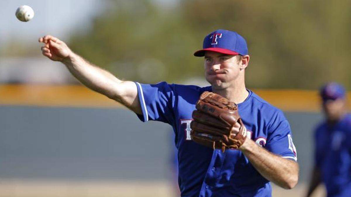 
Rangers reliever Ross Ohlendorf, warming up earlier in spring training, struck out five consecutive Cubs hitters and worked two perfect innings in his spring debut Sunday.
