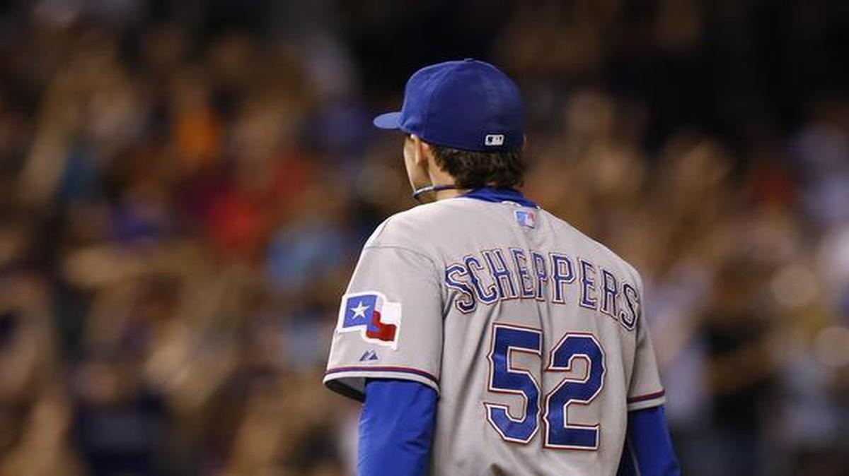 
Tanner Scheppers heads toward the showers after Ben Paulsen’s single in the ninth inning sent the Rangers to an 8-7 loss.
