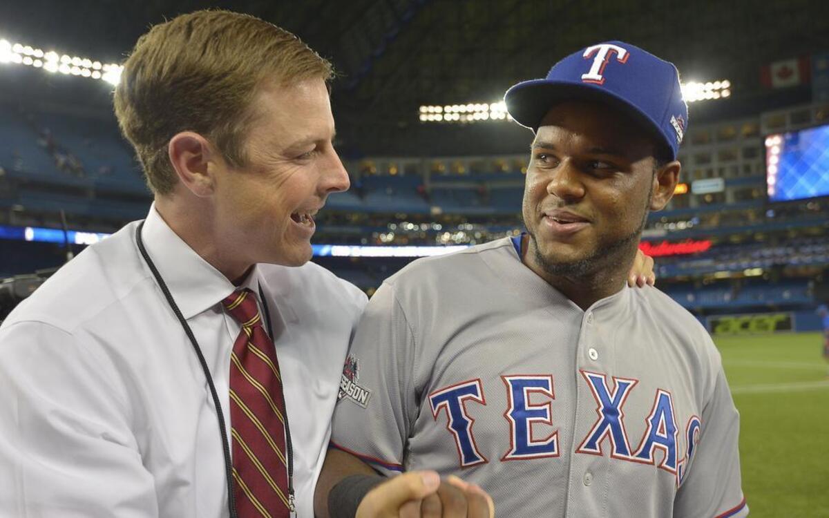 Mike Daly, left, with infielder Hanser Alberto, was promoted to the Rangers’ assistant general manager, along with Josh Boyd and Jayce Tingler.