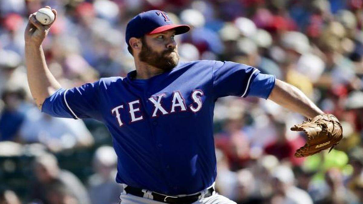 
Rangers starter Colby Lewis worked three scoreless innings against the Angels on Tuesday.
