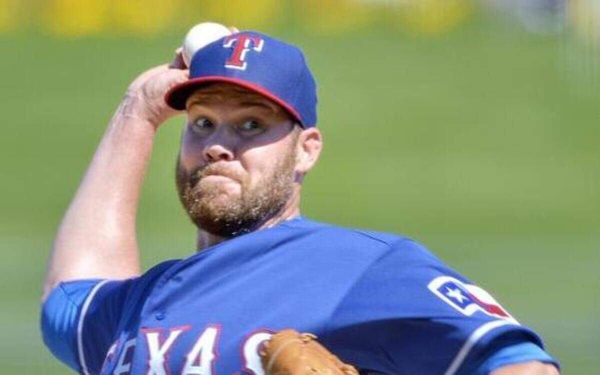 
Colby Lewis, shown in action earlier this spring, was efficient Monday while tossing only 52 pitches in five scoreless innings.
