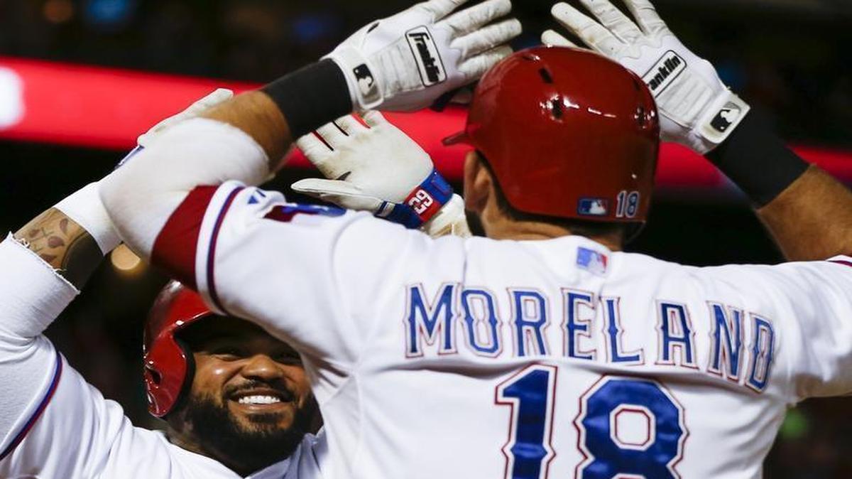 
Prince Fielder celebrates with Mitch Moreland after launching a two-run homer in the eighth. 


