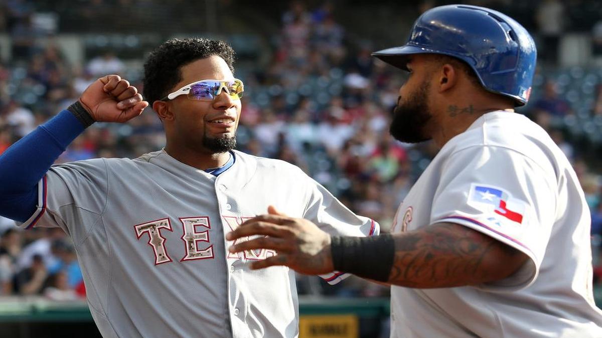 
The Rangers hit three home runs in a 10-8 win at Cleveland on Monday, including from Elvis Andrus, left, and Prince Fielder.
