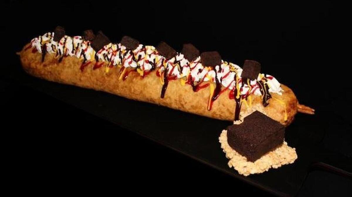 
The Rangers are adding several postseason concession items to the menu, including the Elvis Jabberdog Brownie, a two-foot-long brownie rolled in a Rice Krispy crust and dipped in funnel cake batter and deep fried.

