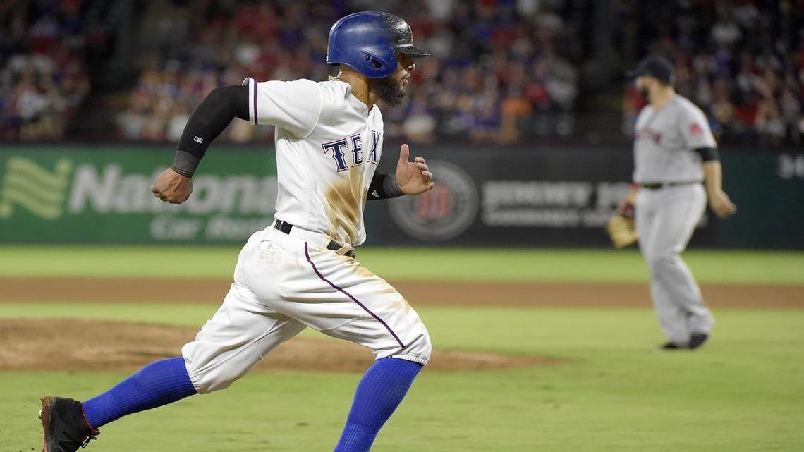 Rougned Odor scores on Jonathan Lucroy’s sacrifice fly in the fourth inning as the Rangers beat the Red Sox 8-2 Wednesday night.