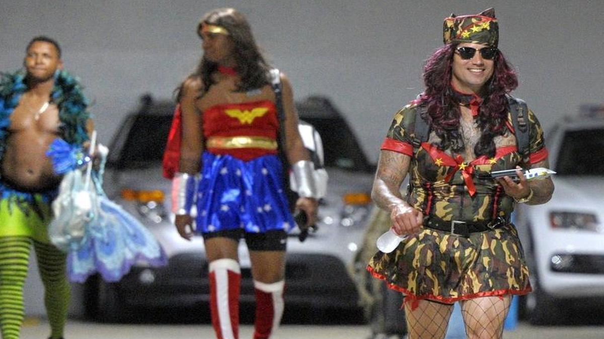 Texas Rangers relief pitcher Matt Bush (51), right, and others walk to their cars at Globe Life Park in Arlington, TX, Thursday, Sept. 22, 2016. The Rangers rookies were put in costumes before they boarded the team bus for the airport on their way to play the Oakland Athletics. The practice of dressing rookies up as women is now banned by Major League Baseball’s new collective bargaining agreement.