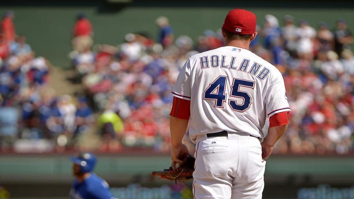 
Derek Holland watched three Blue Jays hitters connect for homers in the first two innings of Game 4.
