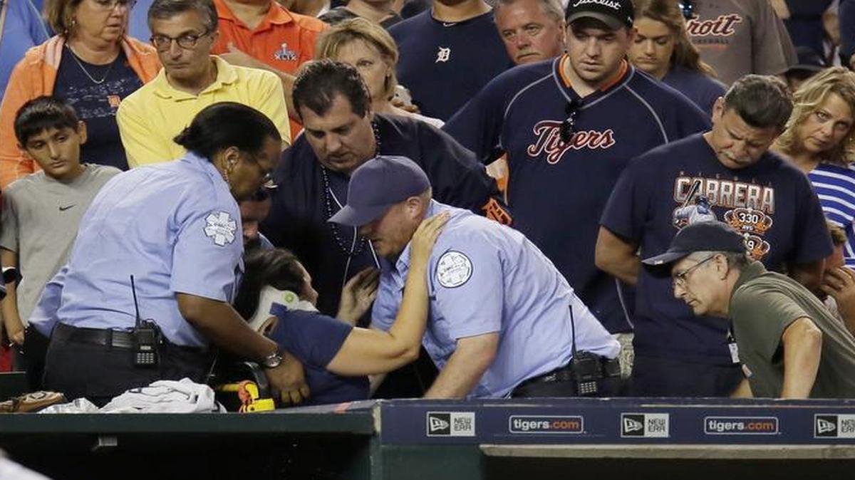 
After being struck by a foul ball Friday night, a Tigers fan stayed on the ground for about seven minutes before being taken to the hospital. She was wearing a neck brace and had a large knot on the side of her face, but she was alert.

