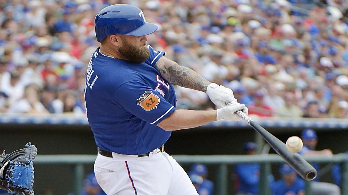 Mike Napoli homered in the second inning Tuesday, his first of the spring, but the Rangers lost to the Rockies 3-2 at Surprise Stadium.