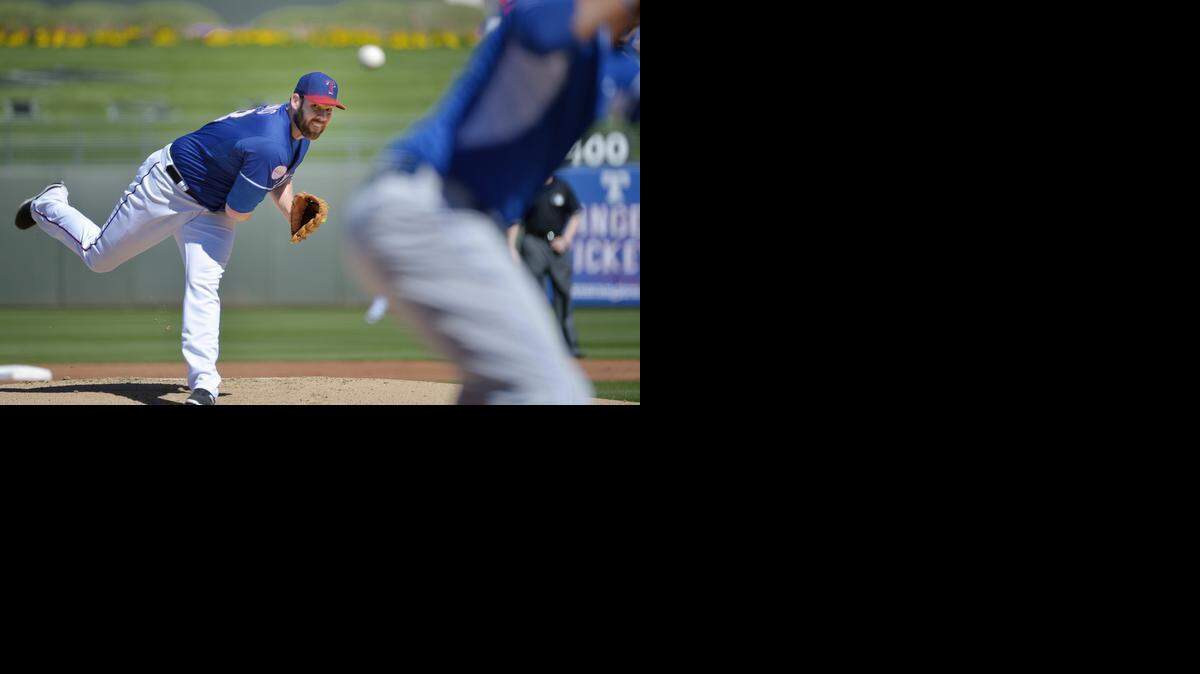 
Texas Rangers starting pitcher Colby Lewis allowed six runs in his one inning of work Wednesday, including three consecutive home runs.


