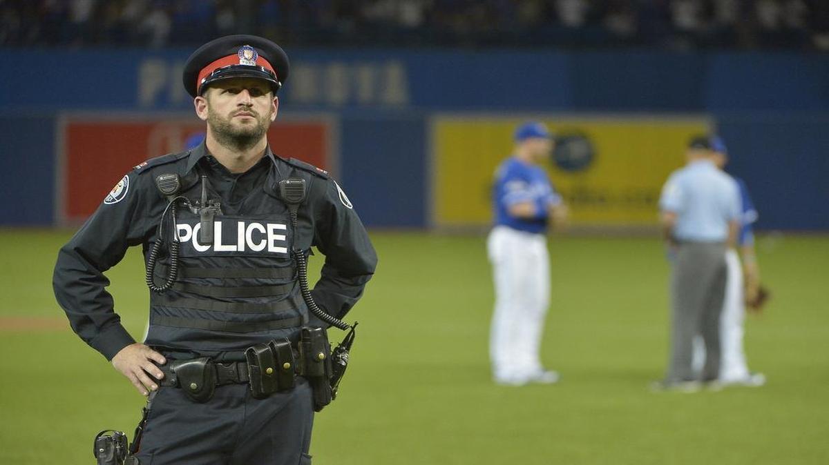 
Toronto police took the field when play was suspended during the seventh inning of Game 5 of the ALDS Wednesday afternoon when upset fans threw trash on the field. The Blue Jays eliminated the Rangers with a 6-3 win at Rogers Centre.
