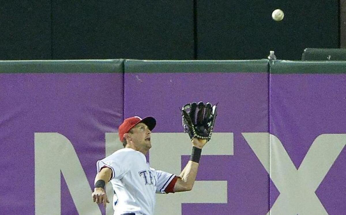 
Drew Stubbs tracks down Ian Kinsler’s line drive in right-center as the Rangers hold on in the ninth to beat the Tigers and snap a three-game losing streak.


