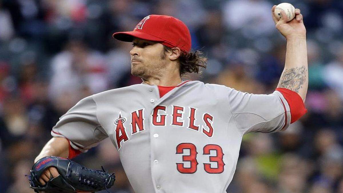 
Angels pitcher C.J. Wilson said the team wouldn’t abandon Josh Hamilton during a personal crisis if the former MVP were playing well.


