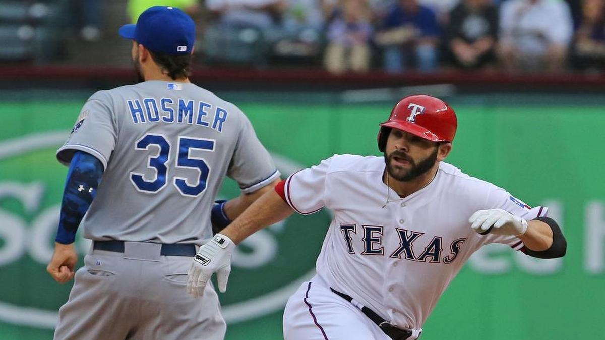 
Rangers first baseman Mitch Moreland, right, darts back to first base after a single in the first inning Wednesday. Moreland went 2 for 3 in his first game since coming off the 15-day disabled list.


