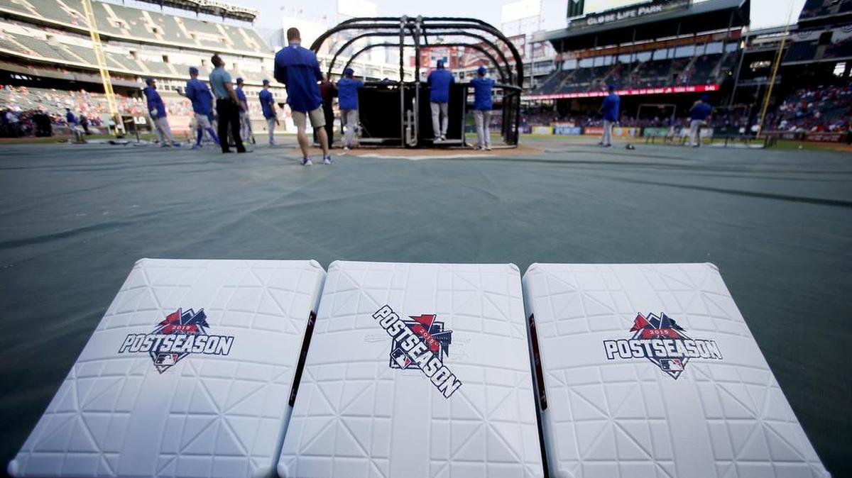 
Bases sit on the field before Game 3 of the American League Division Series between the Texas Rangers and the Toronto Blue Jays at Globe Life Park. 
