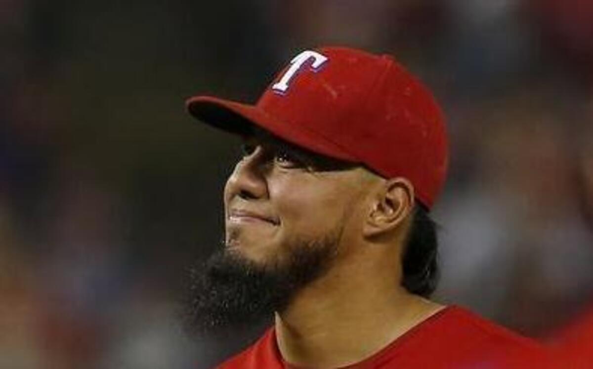 
Rangers starter Yovani Gallardo is pulled in the fifth inning after allowing five runs.


