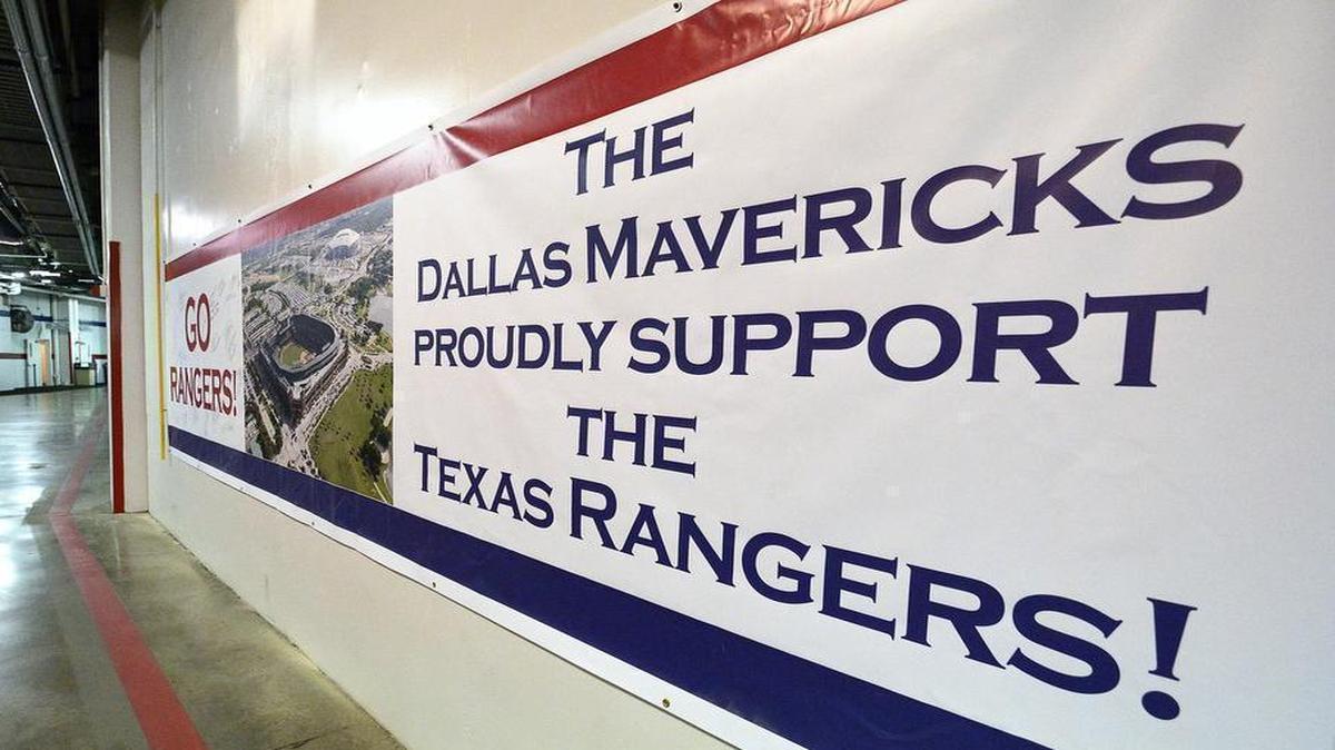 
The Dallas Mavericks sent a banner of support to the Rangers before Game 3 of the ALDS at Globe Life Park. Mavs players signed their names and offered well-wishes to the Rangers.
