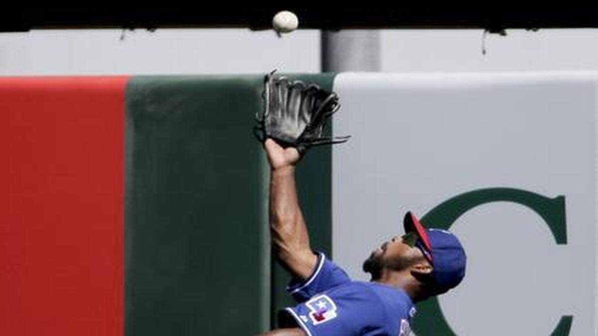 
Rangers outfielder Carlos Peguero had three of the team’s 10 hits in an 8-0 loss to the Mariners Sunday in Peoria, Ariz.
