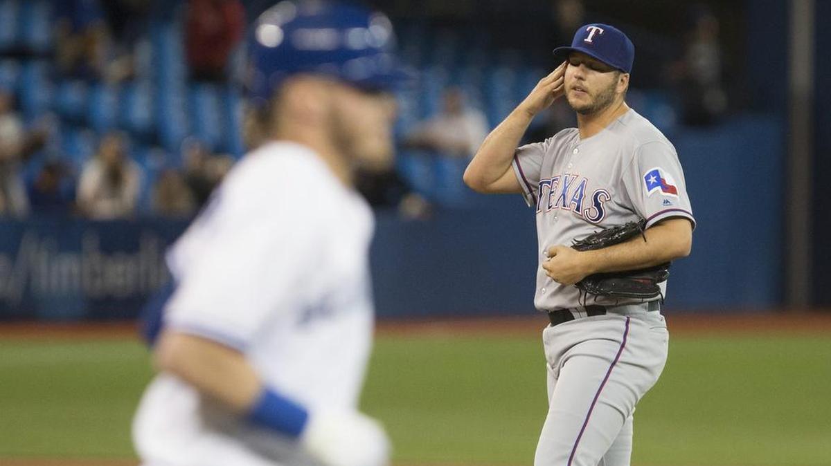 Rangers closer Shawn Tolleson, right, blew his second save Tuesday night when Justin Smoak tied the game at 1-1 with a homer in the ninth. The Blue Jays won 3-1 on Smoak’s two-run homer in the tenth.