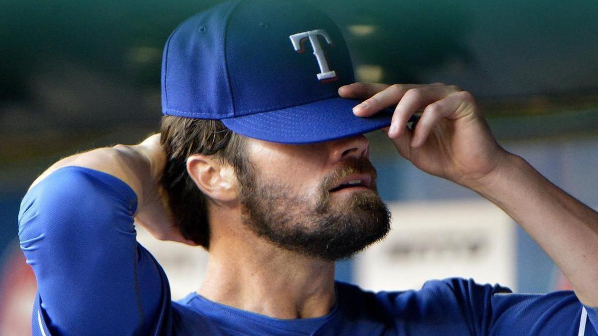 Rangers starting pitcher Cole Hamels was scratched from Tuesday’s game with tightness in his left oblique. Left-handed reliever Alex Claudio made his first major league start in Hamels’ place.