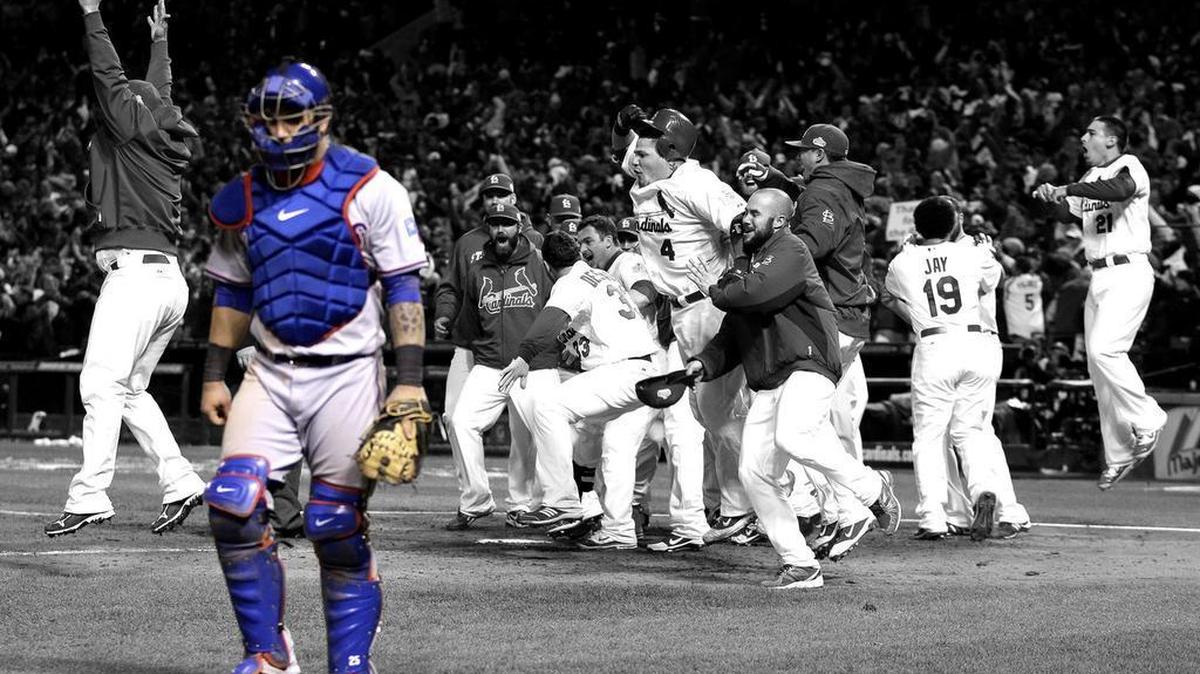 Texas Rangers catcher Mike Napoli walks away as the St. Louis Cardinals celebrate after David Freese hit a walk-off home run during the 11th inning of Game 6 of the 2011 World Series.