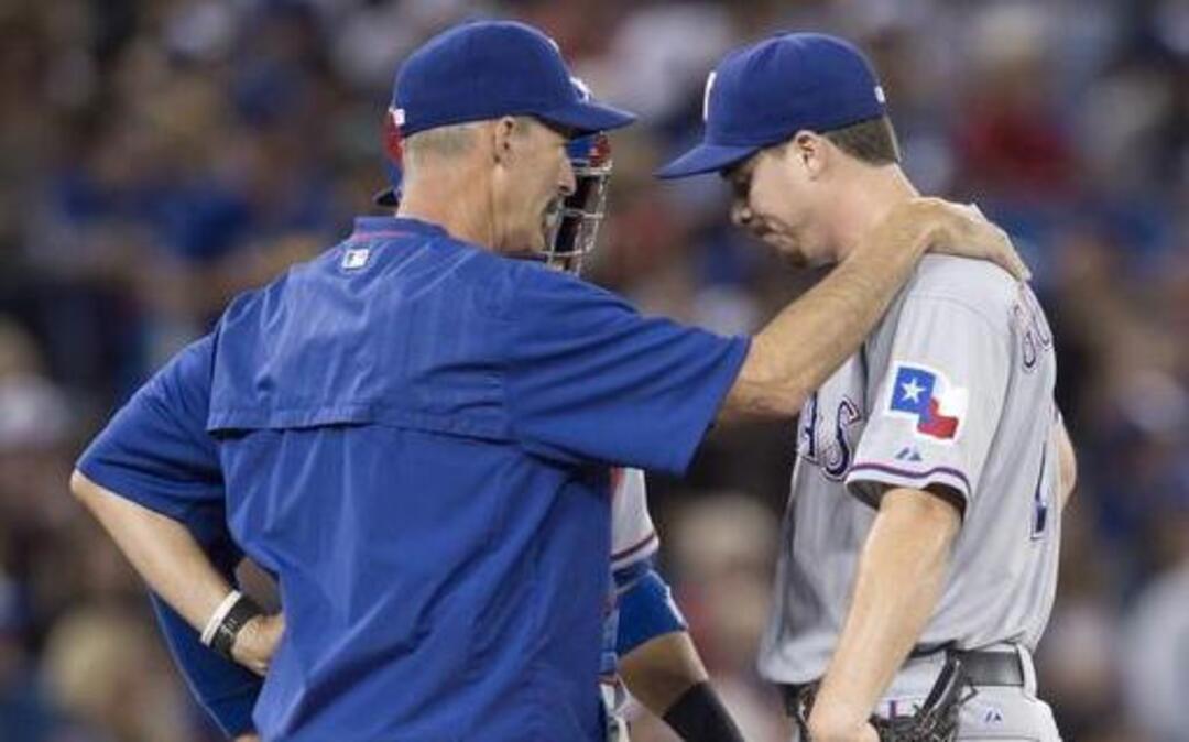 
Rangers starting pitcher Chi Chi Gonzalez, right, talks with pitching coach Mike Maddux, left, and catcher Robinson Chirinos in the fourth inning after the Blue Jays took a 1-0 lead on Josh Donaldson’s home run broke up a no-hitter.
