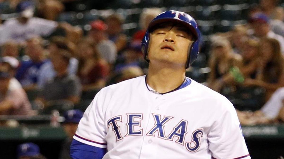 
Rangers outfielder Shin-Soo Choo reacts after striking out earlier this season. Choo is among league leaders with 15 strikeouts on called third strikes out of the zone.
