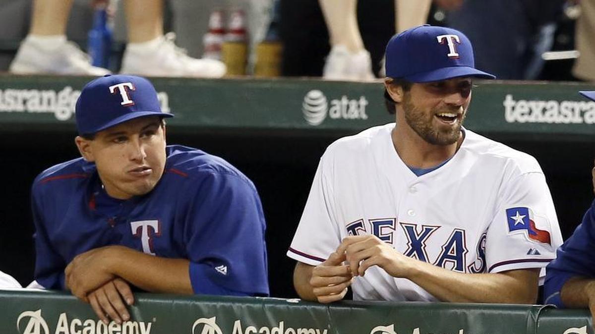 
Rangers pitcher Derek Holland, left, hopes to rejoin the rotation this week after making his fourth rehab start in the minors on Friday. Cole Hamels, center, will start Monday. Yovani Gallardo, right, starts Sunday. 
