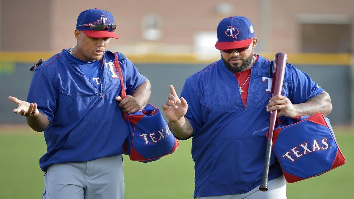 Rangers third baseman Adrian Beltre nd designated hitter Prince Fielder head to morning workouts Monday in Surprise, Ariz.