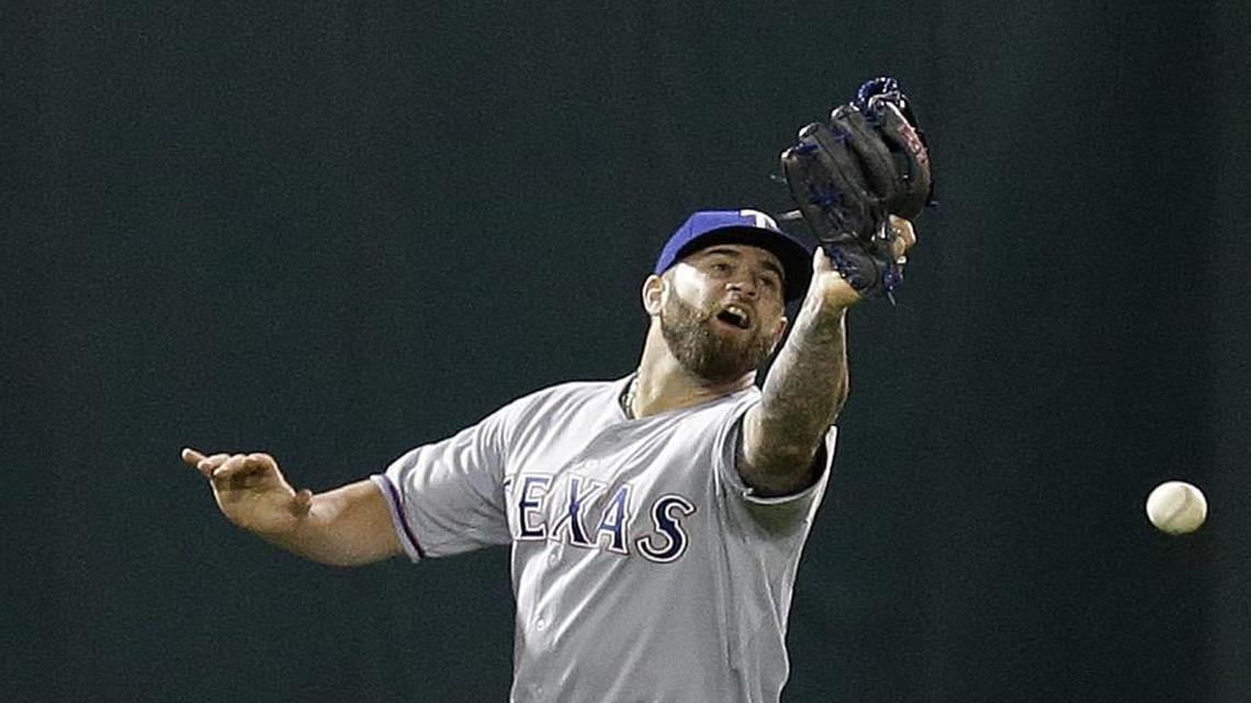 
Mike Napoli had a Josh Reddick fly ball pop out of his glove in left field, leading to an unearned run in the fifth inning Tuesday night.
