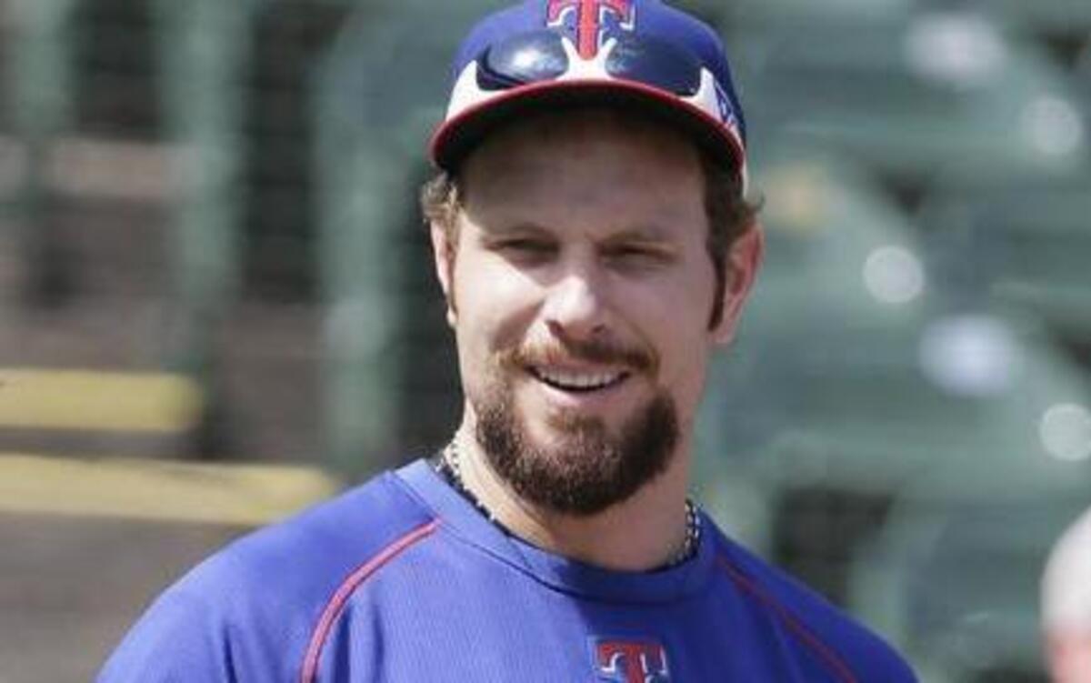 
Texas Rangers outfielder Josh Hamilton chats during batting practice before a recent game. Hamilton said he won’t feel anything extra in playing against the Angels, the team that discarded him. 
