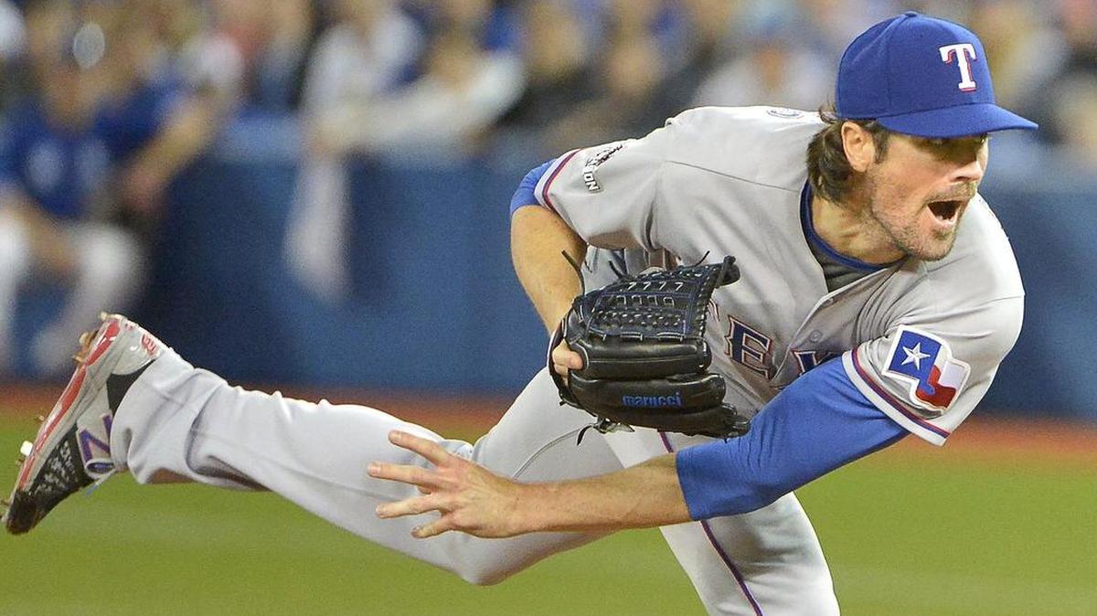 
Rangers pitcher Cole Hamels allowed two earned runs on six hits over seven innings in Game 2.
