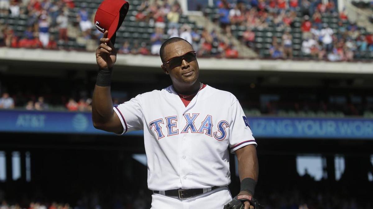 Adrian Beltre acknowledges a standing ovation from fans as he comes out of Sunday’s finale at Globe Life Park.