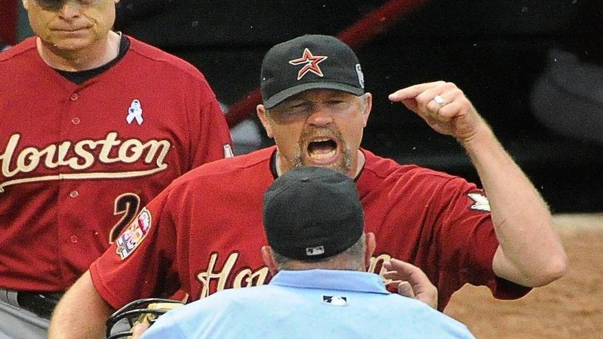 Doug Brocail, giving the business to umpire Dale Scott in a 2012 game as Astros pitching coach, was hired Thursday as Rangers pitching coach.