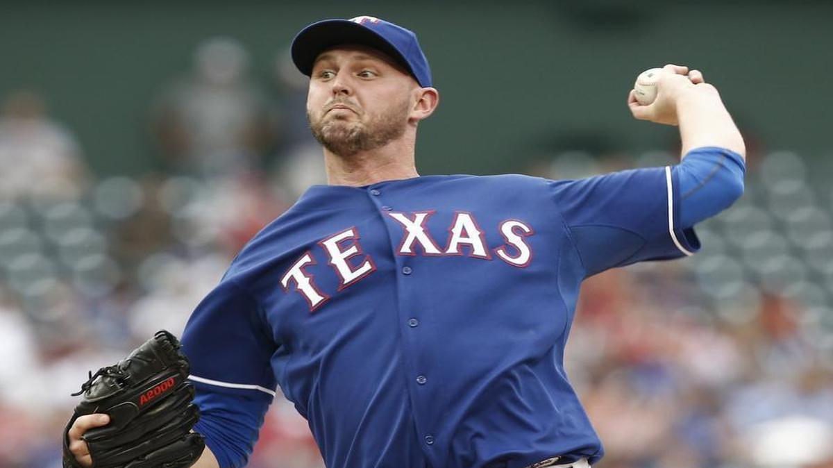 
Texas Rangers starting pitcher Matt Harrison lasted three pitches into the fifth inning and gave up six runs in his first start since May 2014. 
