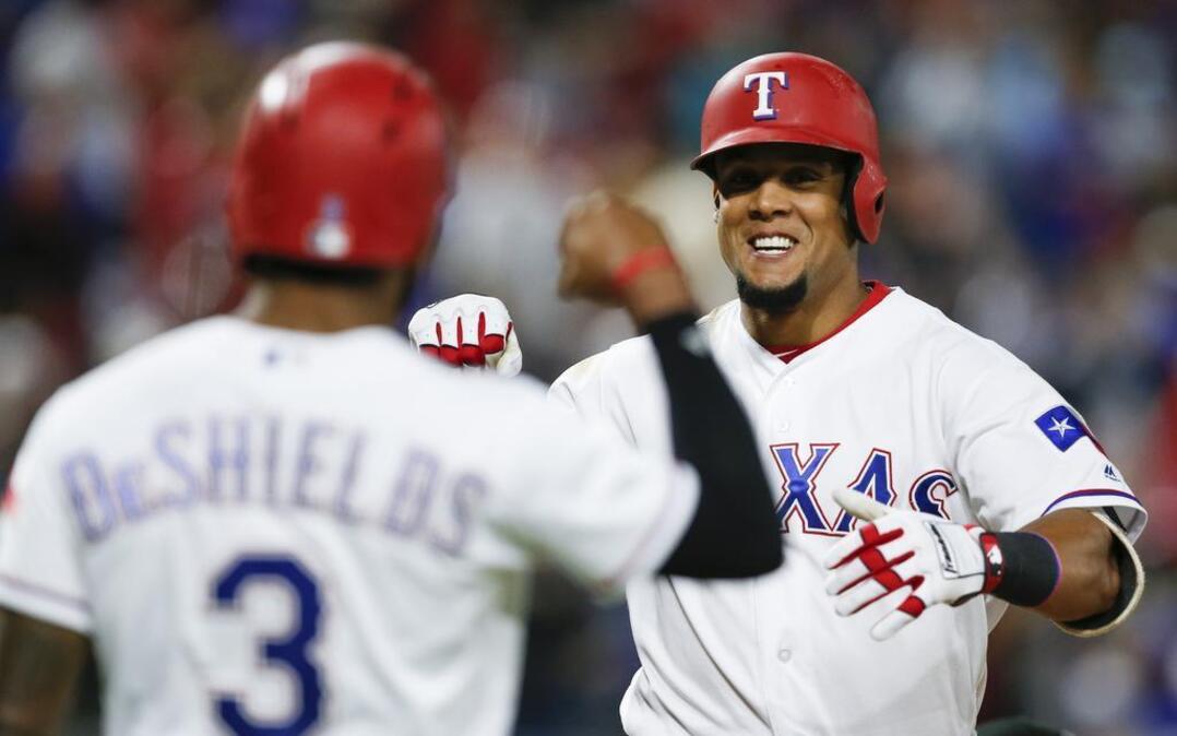 Carlos Gomez, right, celebrating with Delino DeShields after hitting a home run to complete the cycle in game in April, will continue his rehab assignment with Double A Frisco on Wednesday.