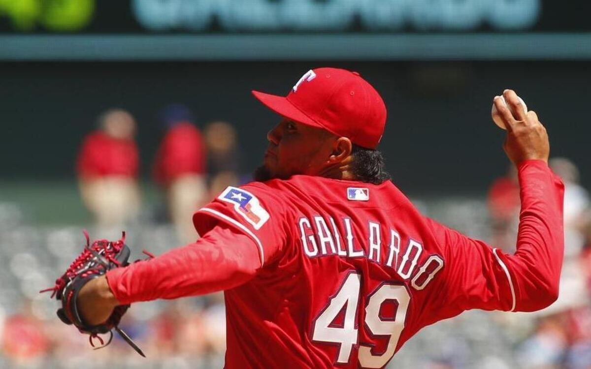 
Texas Rangers starting pitcher Yovani Gallardo was charged with four runs, three earned, and might have been left in the game a batter too long in the seventh. 
