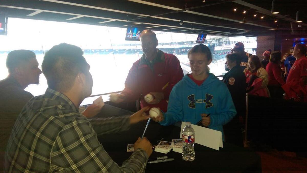 Jim and Emily Watts, of Shreveport, La., right, enjoyed Rangers FanFest for the first time, including getting the autographs of Shawn Tolleson and Ryan Rua.