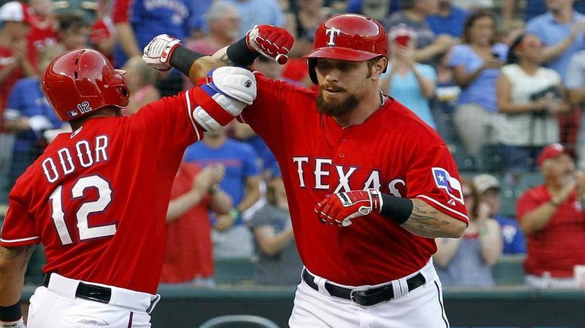 
Rangers slugger Josh Hamilton, right, bumps elbows with Rougned Odor after Hamilton’s home run in the second inning. 
