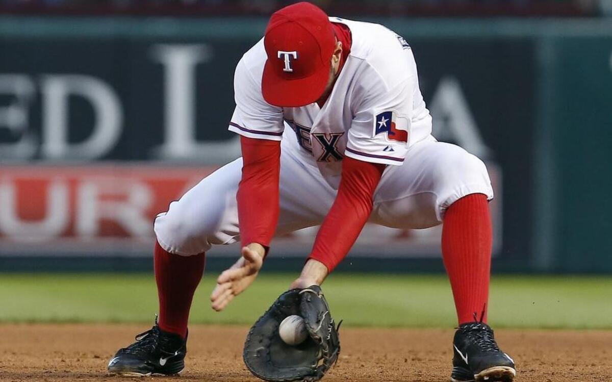 
Rangers infielder Adam Rosales along with the rest of the team has been taking more extensive defensive work before games lately.
