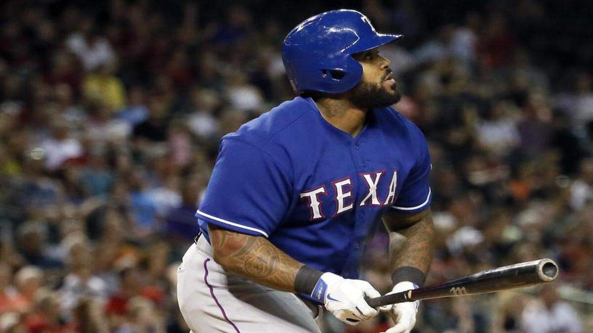 
Rangers first baseman Prince Fielder watches his two-run homer, his first of the season, that gave Texas a 5-1 lead against the Diamondbacks in the eighth inning Tuesday night in Phoenix. The Rangers won 7-1.
