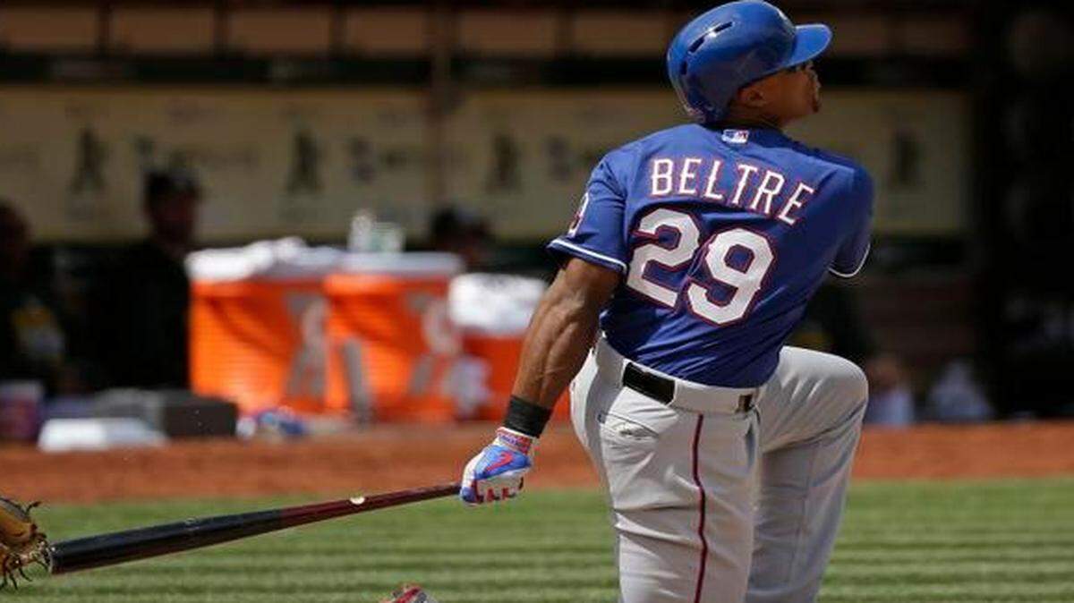 
Adrain Beltre goes to one knee to belt a seventh-inning home run in the Rangers’ rout of the A’s.


