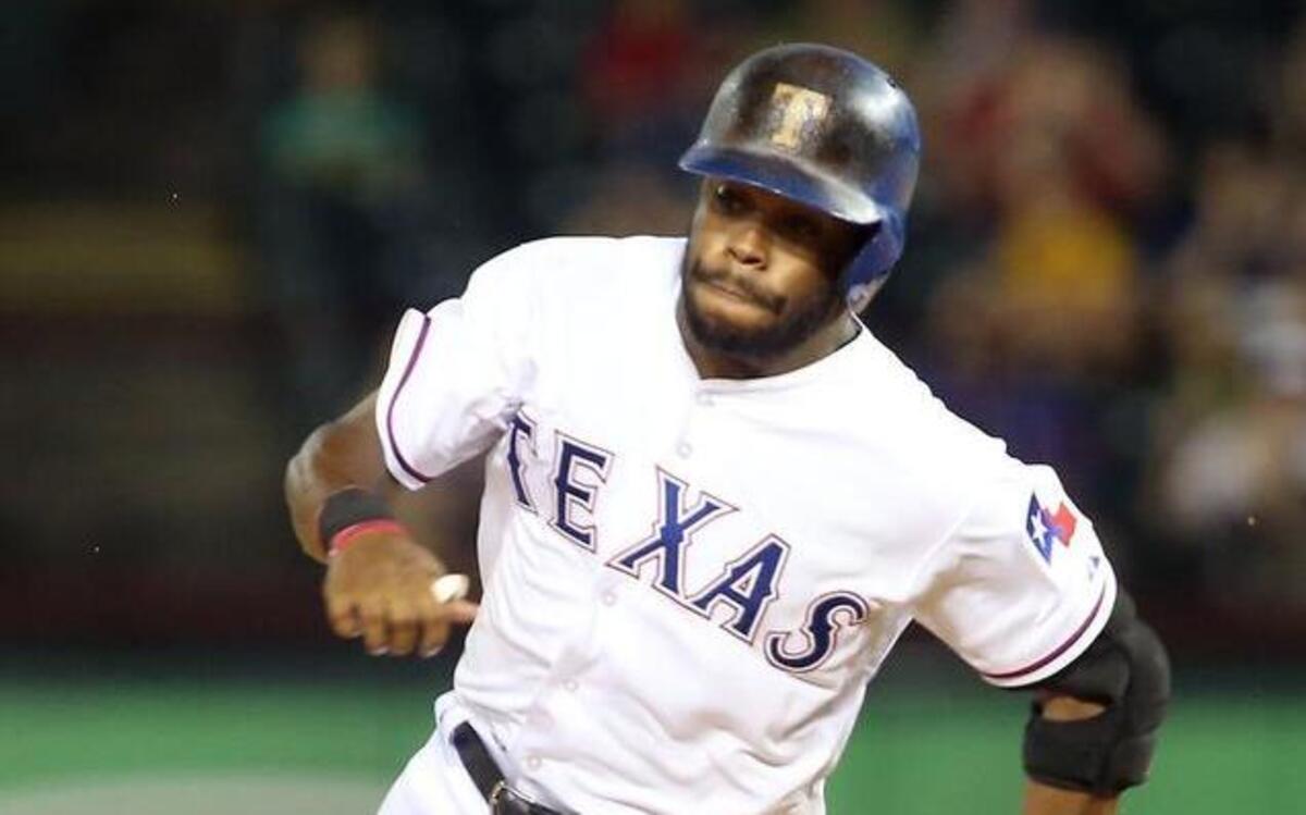
Texas Rangers outfielder Delino DeShields (7) rounds second base on his way to third after hitting a triple in the 9th inning against the Los Angeles Angels at Globe Life Park in Arlington on Sunday. 
