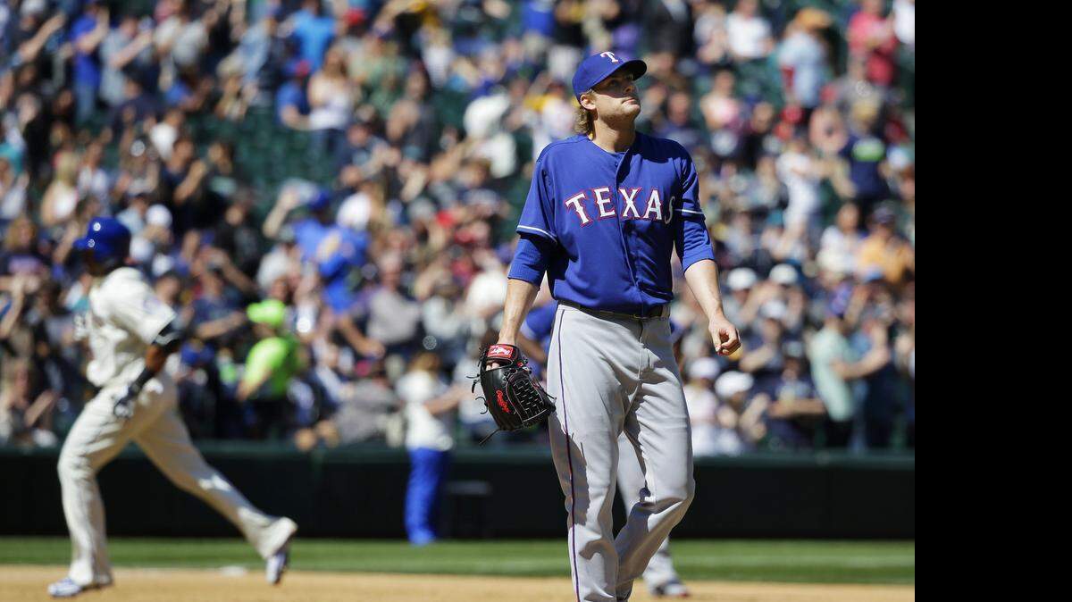 
Rangers starter Ross Detwiler failed to make it out of the third inning Sunday, allowing five runs on seven hits. 



