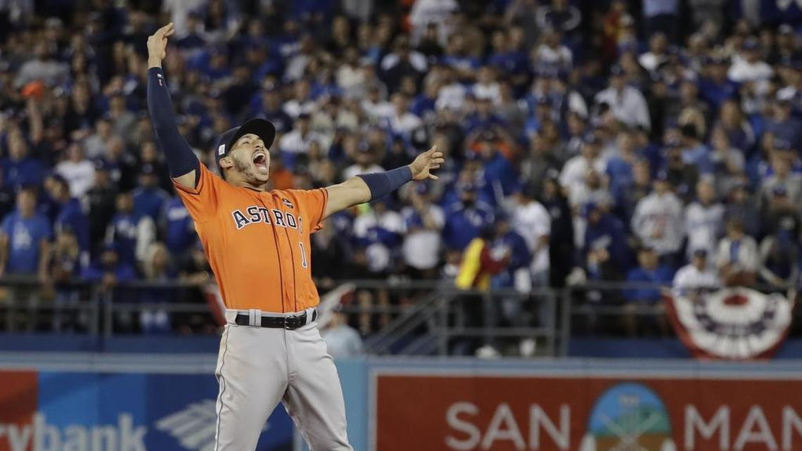 Houston Astros shortstop Carlos Correa celebrates after winning Game 7 of the World Series Wednesday night against the Los Angeles Dodgers. Correa proposed to his girlfriend Daniella Rodriguez a few moments later.