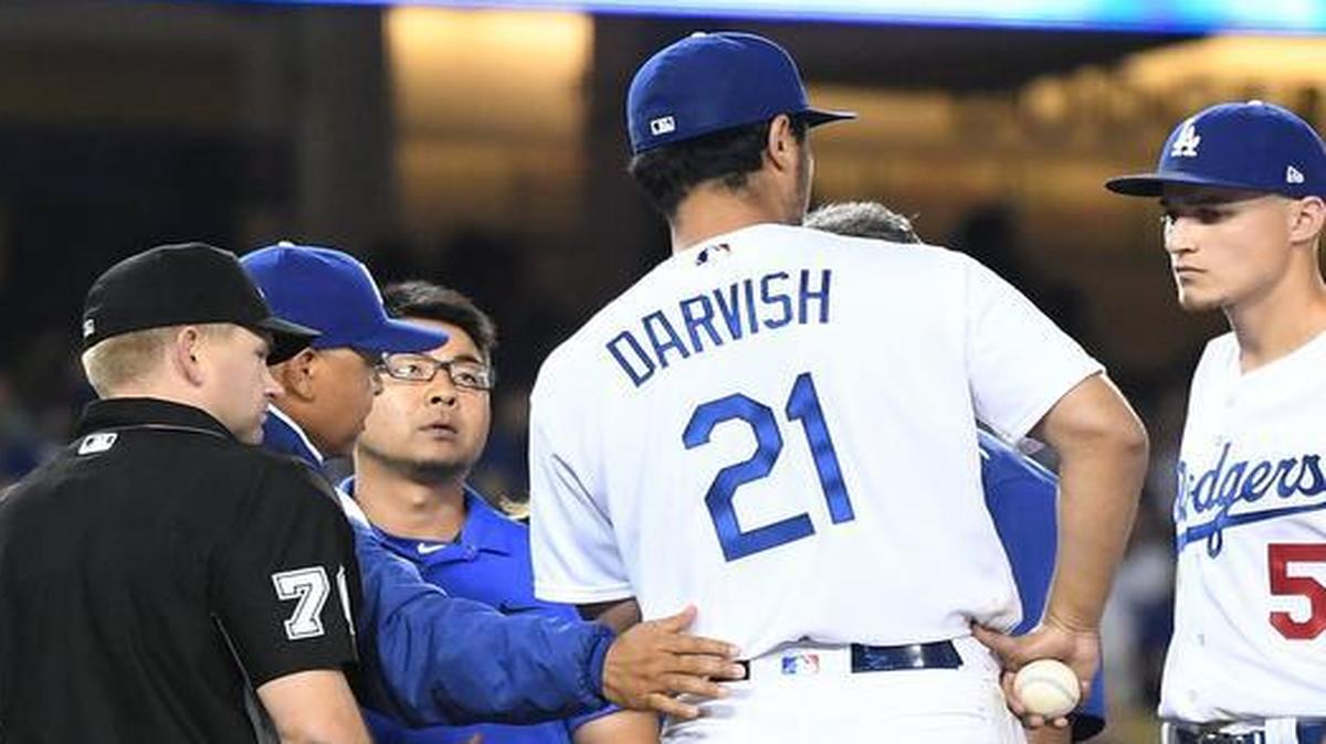 Los Angeles Dodgers pitcher Yu Darvish comes out of the game against the Chicago White Sox during warmups in the seventh inning at Dodger Stadium in Los Angeles on Wednesday, Aug. 16, 2017.