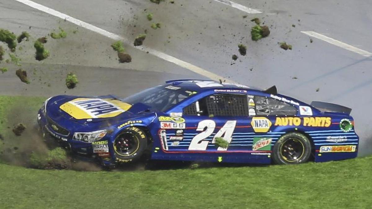 Grass flies in the air after Chase Elliott (24) spins during the NASCAR Daytona 500.