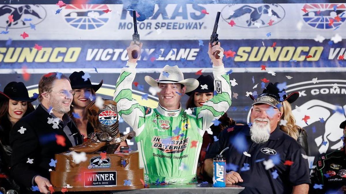 Kyle Busch celebrates winning the Duck Commander 500 race at Texas Motor Speedway on April 9.
