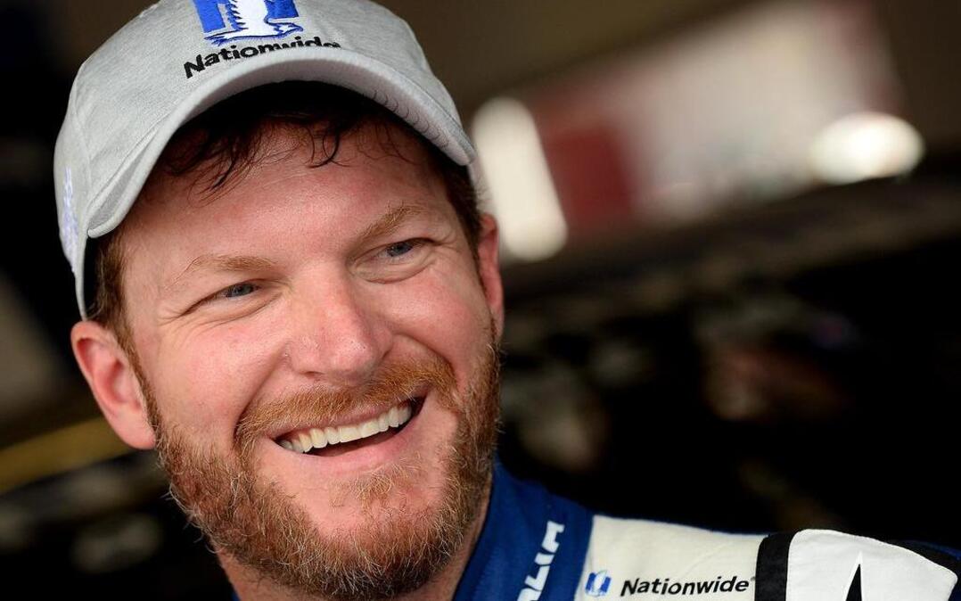 NASCAR driver Dale Earnhardt Jr. laughs as he talks with a reporter following the final practice for the Daytona 500 on Saturday, Feb. 25, 2017, at Daytona International Speedway in Daytona Beach, Fla.